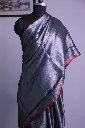 Radiant Elegance: Silver Tissue Linen Saree